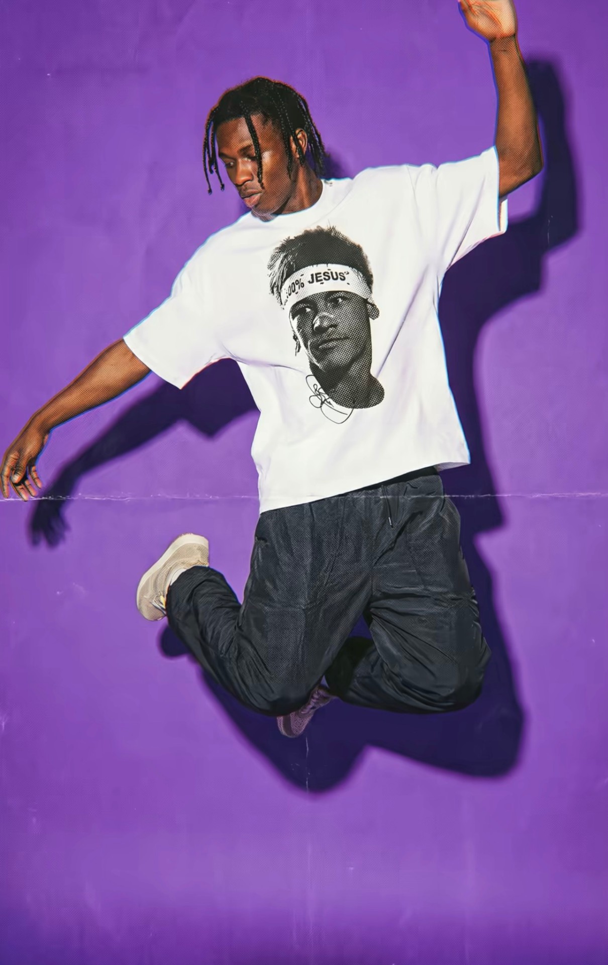 Customer mid-air wearing NJR shirt